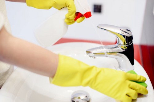 Cleaning technician reviewing service terms and payment details