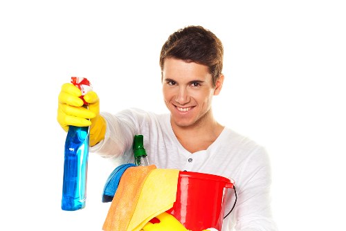 Carpet cleaning team following safe working practices in Brixton